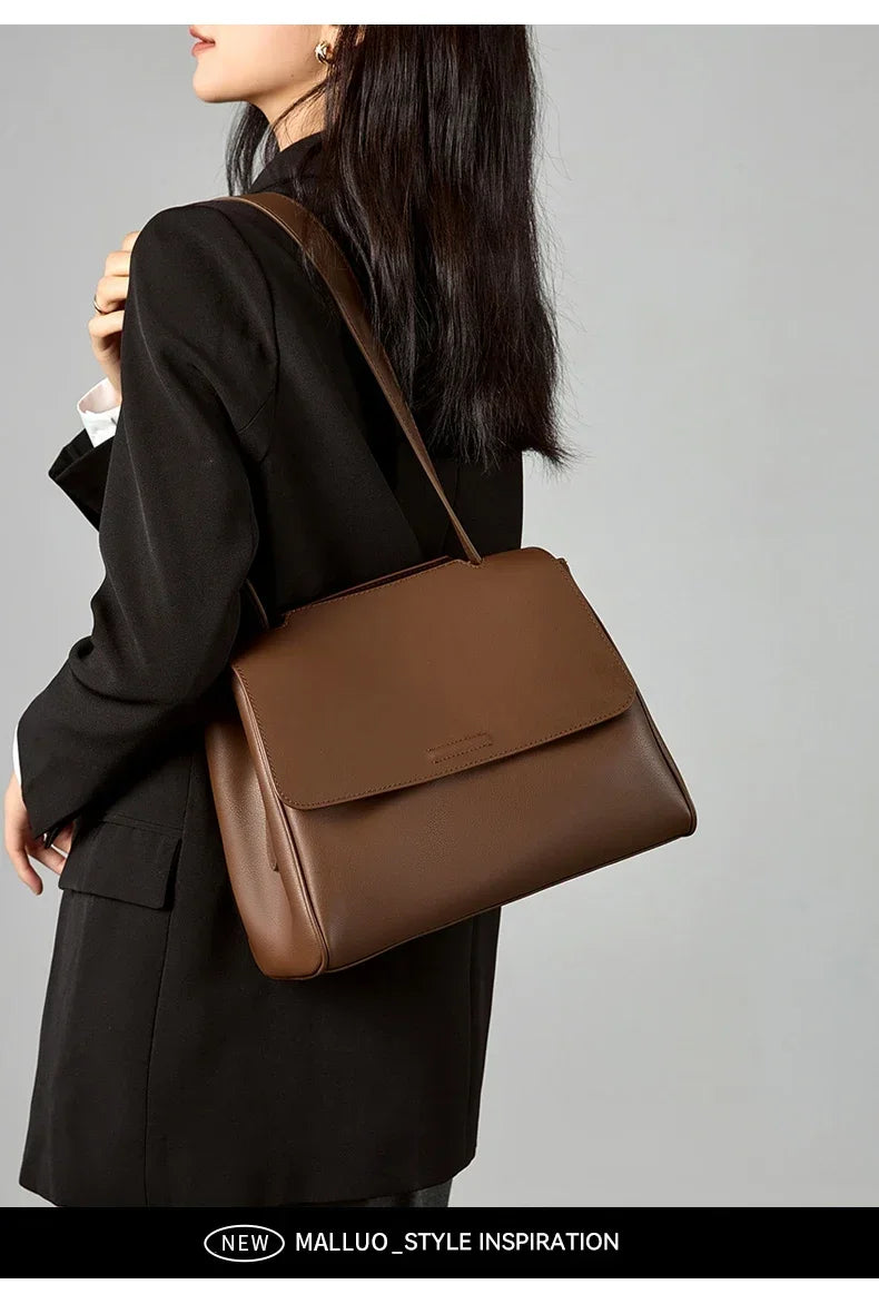 The Minimalist Cowhide Messenger